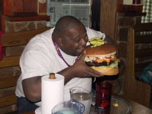 fat-guy-eating-giant-hamburger.jpg