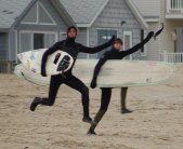Surfers Waving